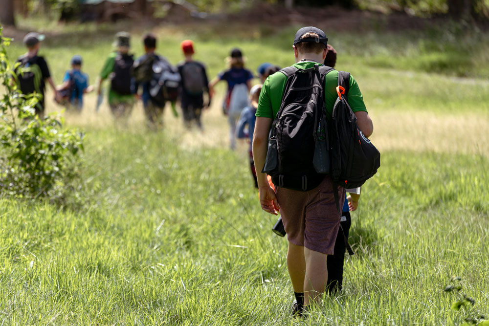 Photo of kids and a teacher taking part at events at PTI Arima, Trinidad